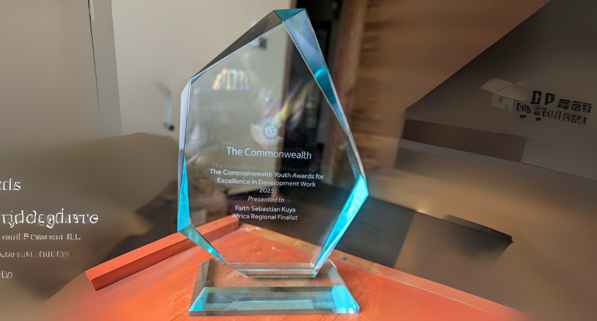 Faith Kuya Receives Commonwealth Youth Award Trophy as Africa Regional Finalist for Excellence in Development Work